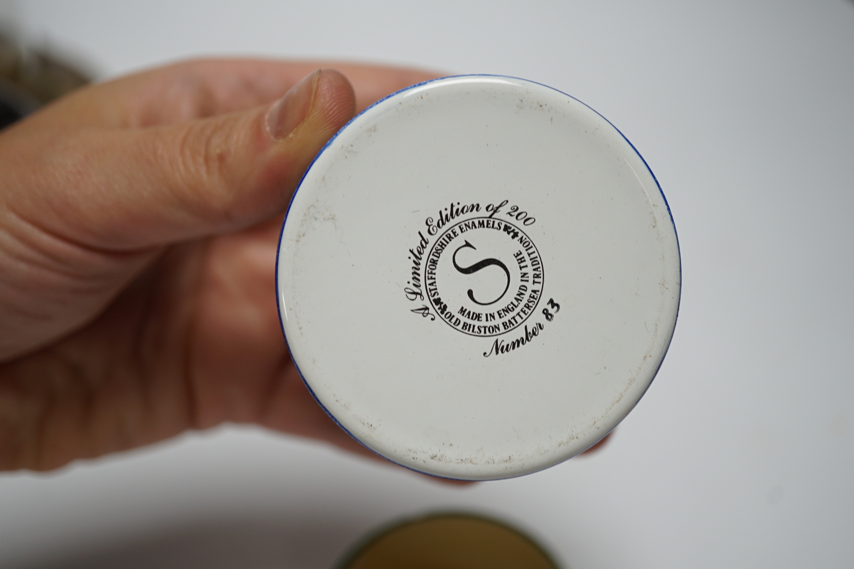 Sundry items including domed clock, limited edition enamel box, Clarice Cliff Crocus pattern pot and silver mounted hat pin cylinder, the largest 29cm high